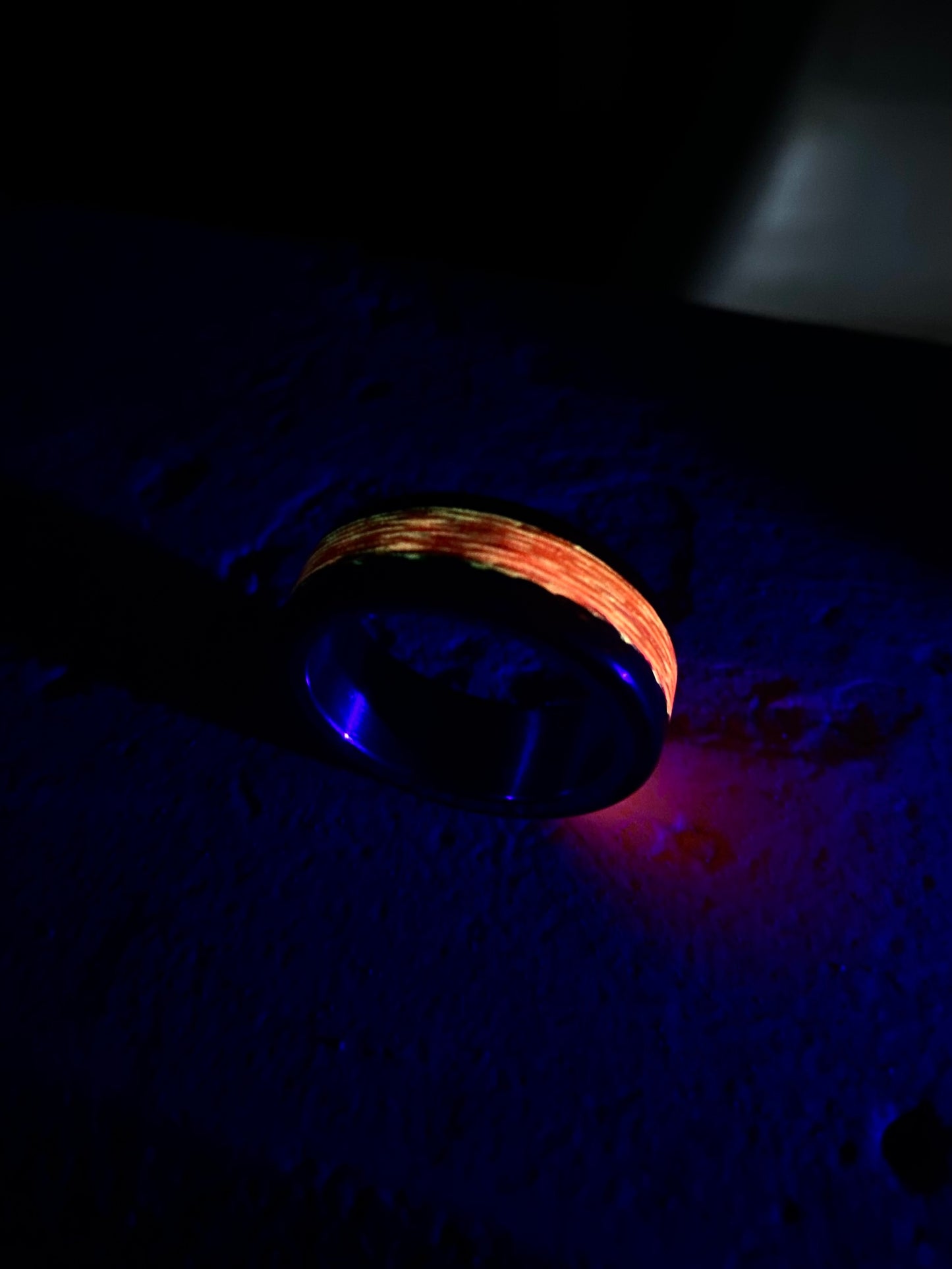 Phosphorescent Ring in Carbon Fiber and Titanium
