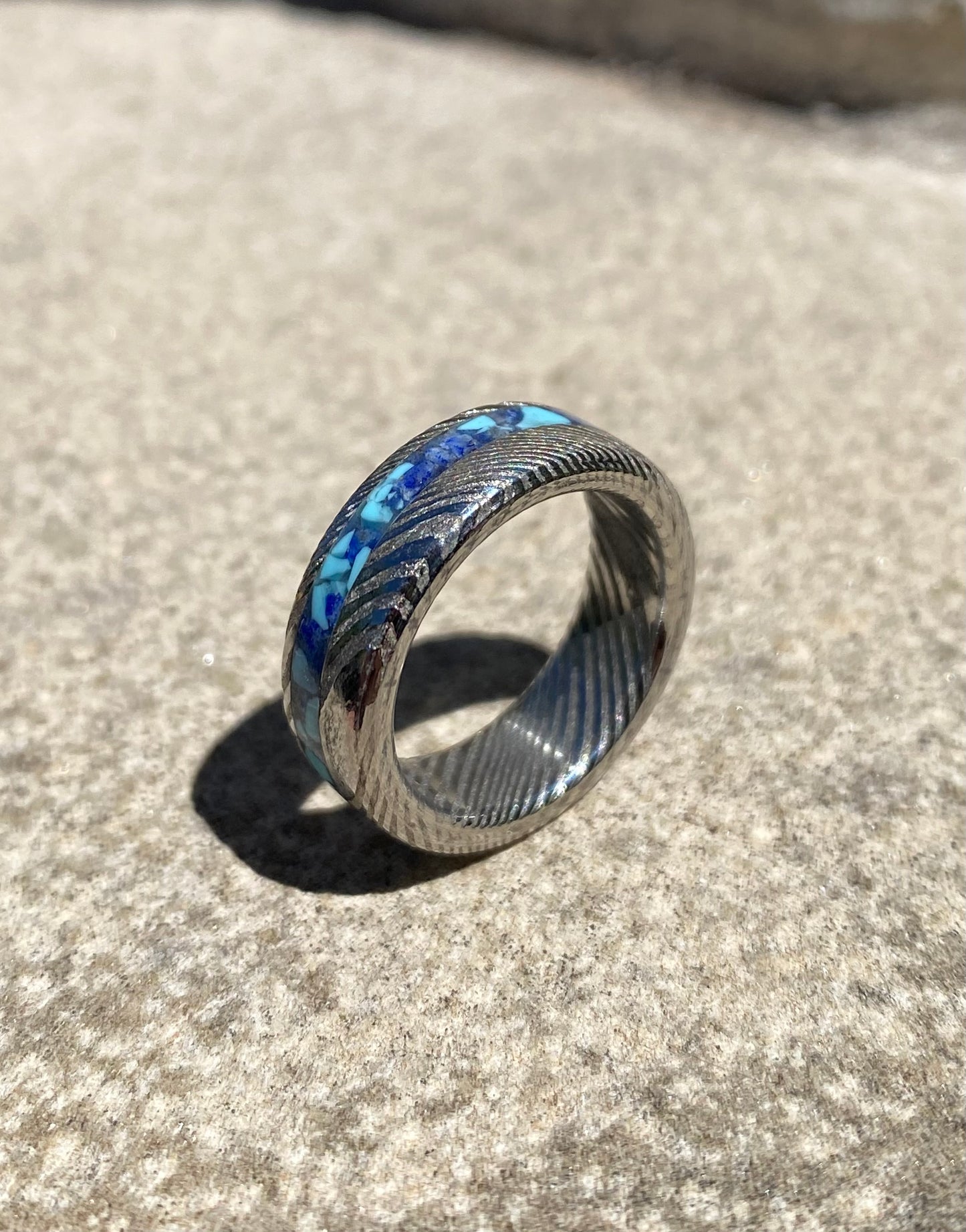 Damascus Steel and Lapis Lazuli ring with side inlay