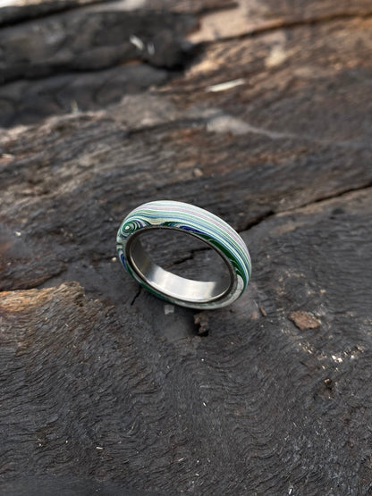 Fordite and Titanium ring