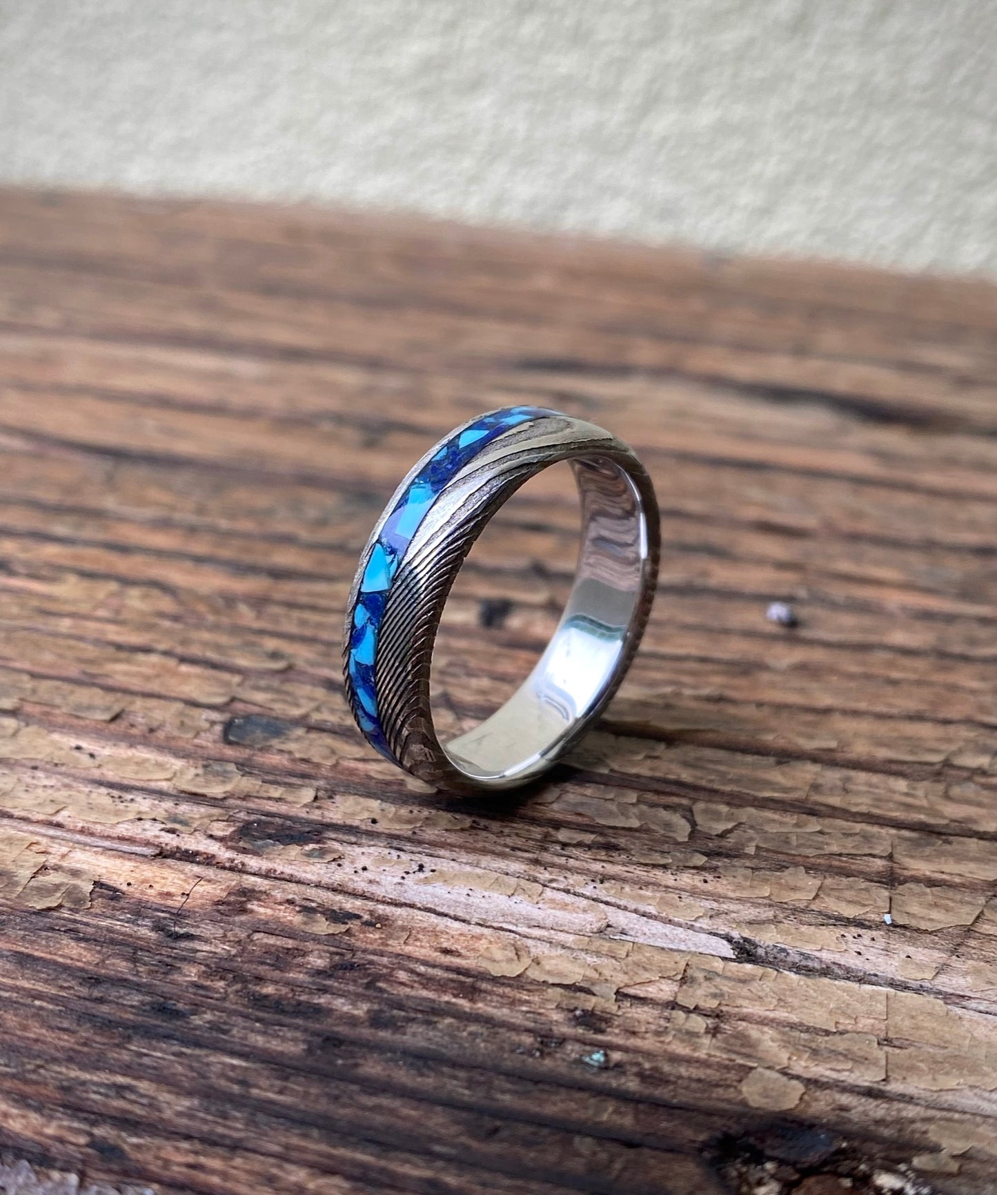 Damascus Steel and Lapis Lazuli ring with side inlay