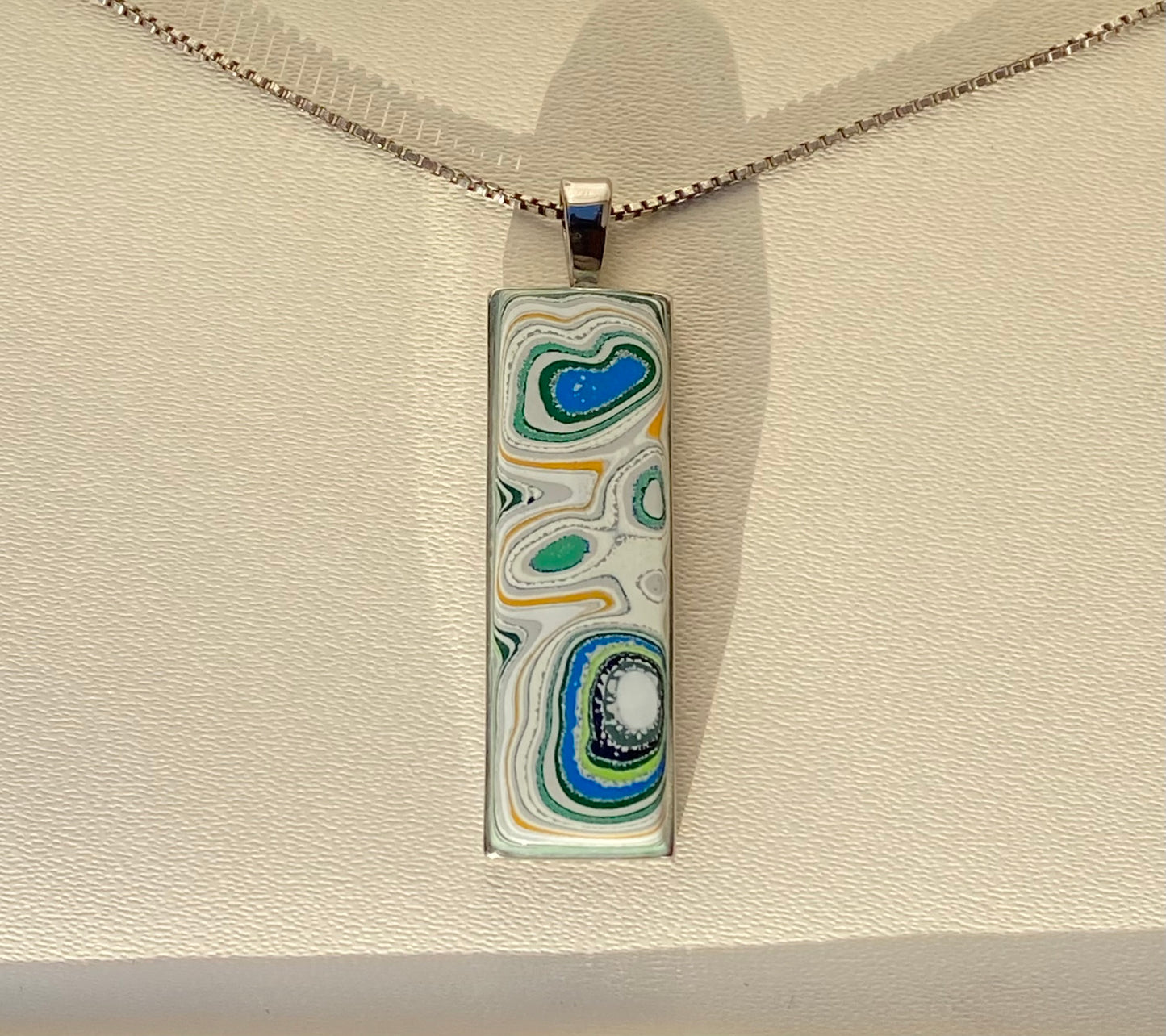 Fordite necklace, "rectangle" model - Titanium and Fordite pendant