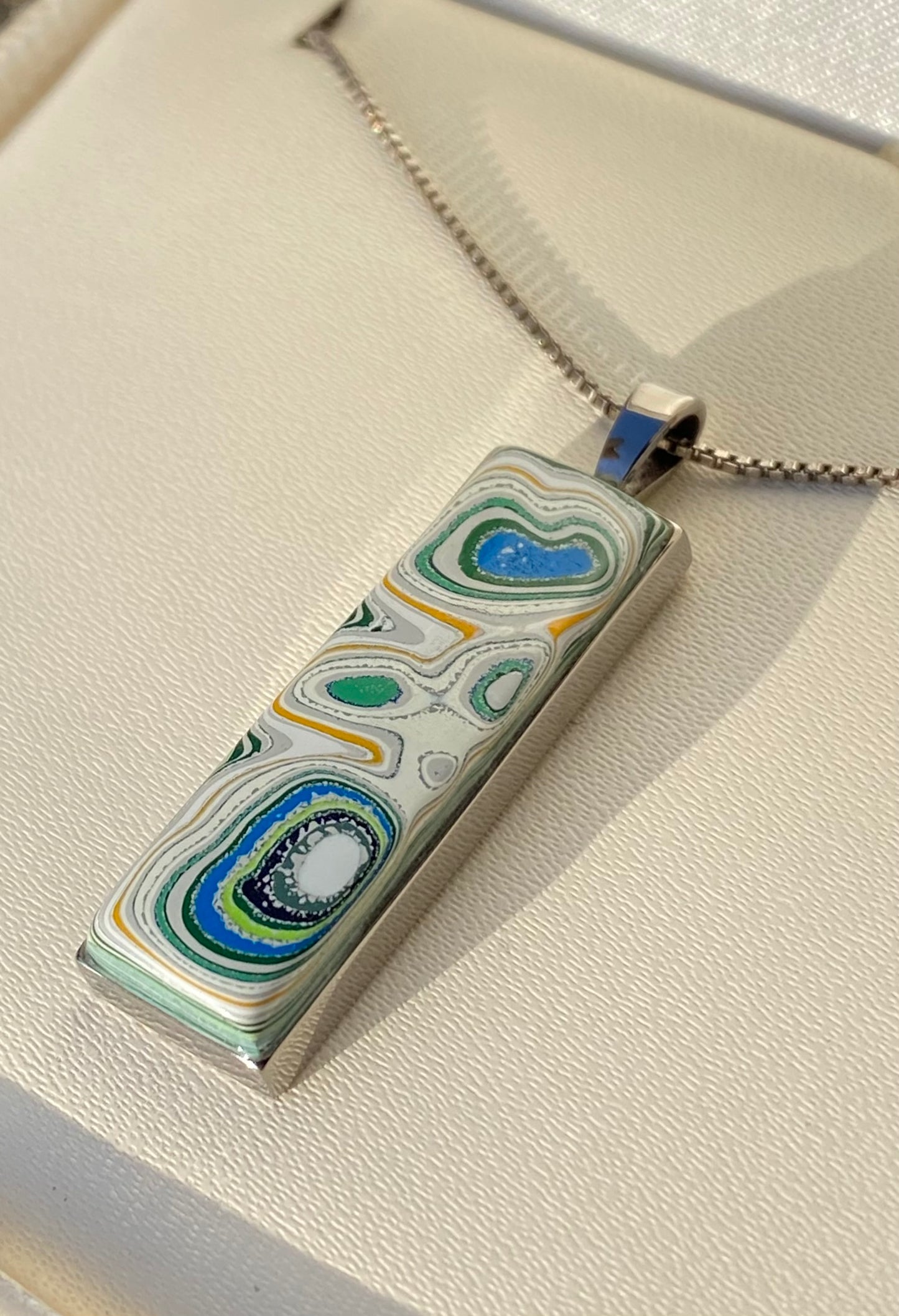 Fordite necklace, "rectangle" model - Titanium and Fordite pendant