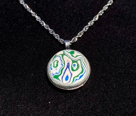 Fordite necklace, "circle" model - Titanium and Fordite pendant